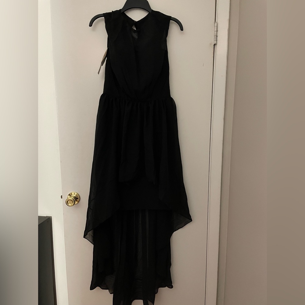 wedding guest dress.  Short front and flow in the back